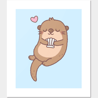 Cute Little Otter Holding A Seashell Posters and Art